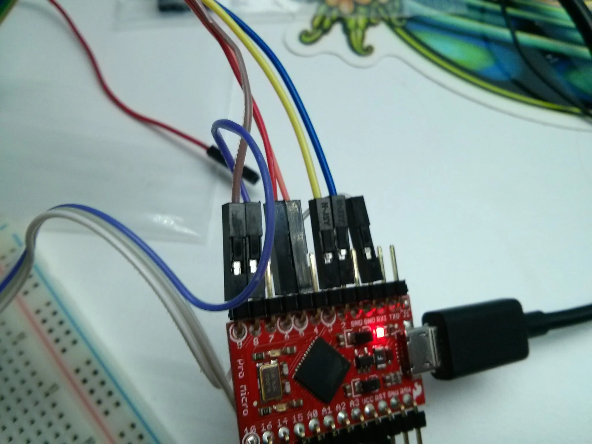 An Arduino pro mini! Love this guy, usb mini b with power regulation and serial conversion on-board. Nice and easy.