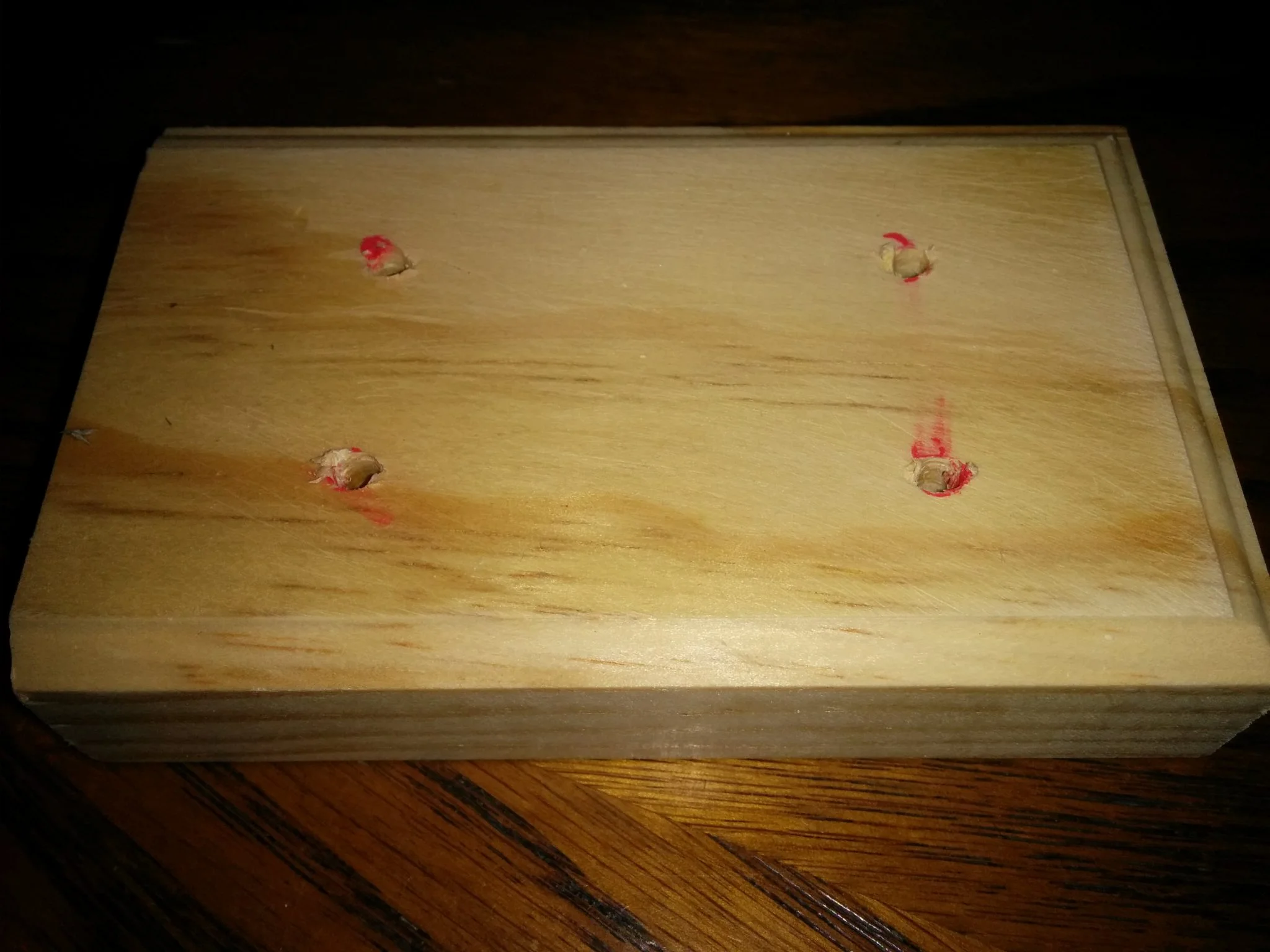 Instead of being exact, I lazily used a paint pen to mark the pegs on the 3d printed model, then pressed it on to the wood. Then drilled where the marks were. The result was 'good enough'.
